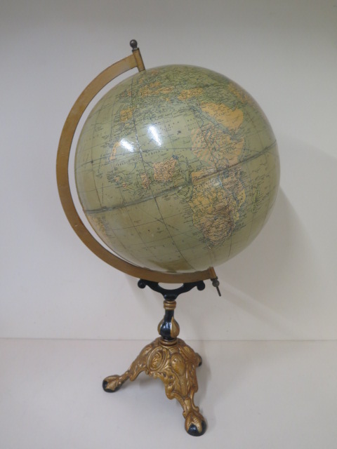 A philips 13.5 inch challenge globe on a painted metal stand, 64cm tall, reasonably good condition -