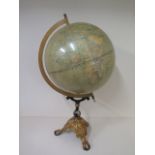 A philips 13.5 inch challenge globe on a painted metal stand, 64cm tall, reasonably good condition -