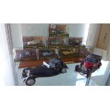 Eight boxed Classic Corgi sports cars with a stand and two Franklin Mint cars with boxes