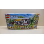 A boxed and sealed lego Creator 3 in 1 set No 31052. Some wear to box