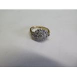 An 18ct yellow gold diamond cluster ring, head measures 15 x 12mm, ring size M, approx 4gs, some