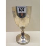 A silver goblet, hallmarked London 1930-31, indistinct makers mark - possibly M & C, with engraved