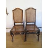 A pair of beechwood caned side chairs, 97.5cm high