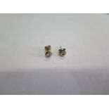 A pair of 9ct yellow gold diamond stud earrings, each approx 0.10ct, generally good condition
