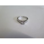 An 18ct white gold solitaire diamond ring, the central diamond 0.43 colour H clarity I1 with IGI