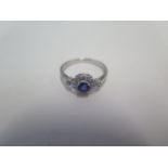 An 18ct white gold sapphire and diamond ring, ring size M, approx 2.5grams, in good bright condition