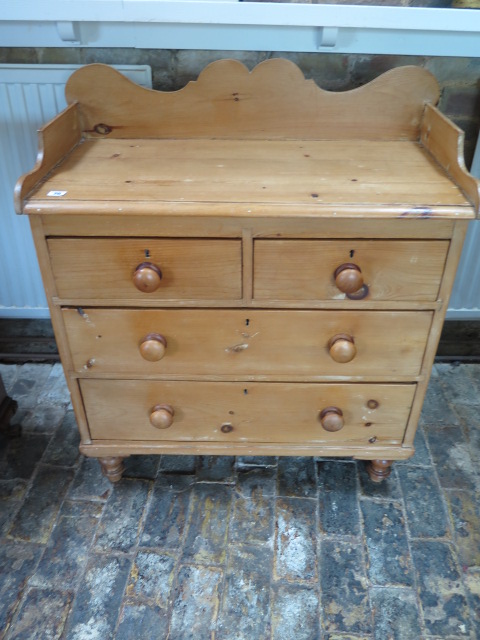 A Victorian stripped pine 4 drawer chest with a galleried top, 98cm x 87cm x 43cm