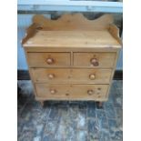 A Victorian stripped pine 4 drawer chest with a galleried top, 98cm x 87cm x 43cm