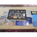 A collection of coins and banknotes including 10 x £5 coins, 2 x Rothmans Rare banknotes folders