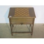 An oak work box with chessboard top, 54cm tall x 49cm x 34cm