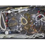 A collection of assorted costume jewellery, watches etc.