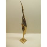 A bronze gilt figure of a stork, 47cm tall, some gilt loss but generally good condition