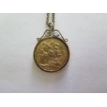 A Victorian full gold sovereign in a 9ct mount on a plated chain, total weight approx 12.4 grams