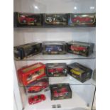 A collection of 9 Burago 1/18 scale boxed sports cars and a boxed Tonk Polistil Ferrari 500 F2,
