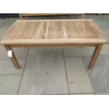 A boxed teak coffee table, new and boxed, 120cm x 60cm