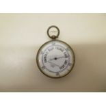 A Negretti and Zambra of London pocket barometer, no:9896, 4.5cm wide, barometer appears to be