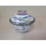 A famille rose enamel covered bowl, 10cm tall x 12cm diameter with restorations to both top and