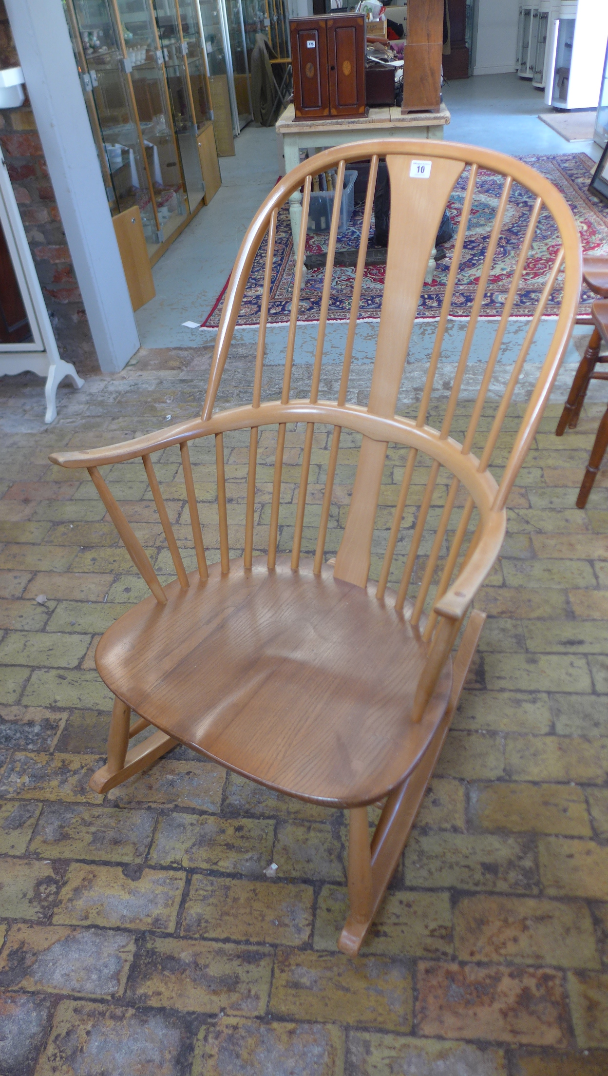 An Ercol light elm rocking chair in good condition