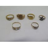 Five 18ct gold rings and a part ring, tests to approx 18ct, one ring missing a pearl, some bending