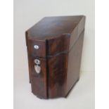 A Georgian mahogany knife box with a relined interior in polished condition, 39cm tall x 24cm x 26cm