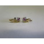 A pair of 18ct gold diamond and ruby earrings, 2cm long and approx weight 5grams