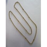 A gold necklace, approx 115cm long, tests to approx 18ct, weight approx 33.5grams, generally good