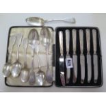 Seven silver spoons, approx 6.9 troy oz and a boxed set of 6 silver handle knives