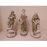 Three Royal Doulton Dux figures, shepherd and shepherdess and a fish seller. Shepherd has damage and