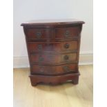 A small bowfront chest of four drawers,, 53cm tall x 42cm x 33cm