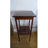 An Edwardian mahogany plant stand with an under tier, 85cm tall x 38cm x 38cm