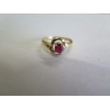 An 18ct yellow gold ruby and diamond ring, ring size L, approx 1.8 grams, in generally good