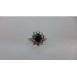 A hallmarked 18ct white gold diamond and sapphire ring, size L, approx 3.8gs, head approx 11mm x