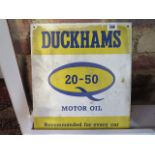 Automobilia: a Duckhams motor oil metal advertising sign, 38cm x 31cm, a 'Fulda' advertising sign,