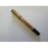 A Watermans 9ct yellow gold cased safety pen marked 14VS to base. Case generally good but wear to