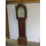A 19th century 8 day longcase clock with a painted arched dial with second hand and calander, signed