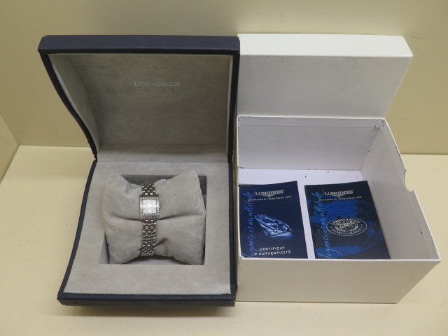 A ladies Longines Dolce Vita diamond set stainless steel quartz wristwatch with box and booklets,