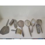 Nine assorted silver back dressing table pieces