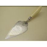 A silver presentation trowel Sheffield 1863 H W & Co presented August 22nd 1865, 32cm long, total