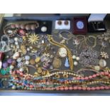 An assortment of costume and silver jewellery