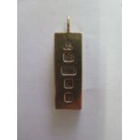 A 9ct yellow gold ingot pendant, approx weight 31 grams, 5cm tall with some usage but generally good