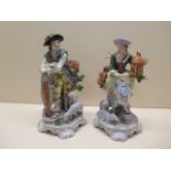 A pair of Sitzendorf porcelain figures of shepherd and shepherdess, 22cm tall with no obvious damage