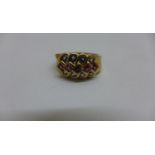 A 9ct gold ruby and tanzanite ring, size Q, approx 5gs, hallmarked, generally good condition