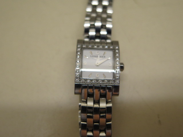 A ladies Longines Dolce Vita diamond set stainless steel quartz wristwatch with box and booklets, - Image 3 of 7