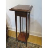 An Edwardian mahogany plant stand, 96cm high