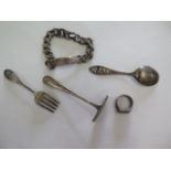 A silver ring, bracelet, pusher and spoon and fork, total weight 3.3 troy oz