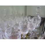 A collection of Waterford crystal comprising: decanter and stopper 27cm high, six water glasses 21cm