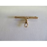 A 15ct yellow gold watch pin brooch, 4cm long and approx 4.3grams, in good condition