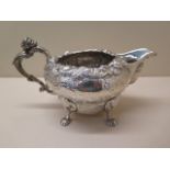 A heavy Georgian silver mask jug, hallmarks rubbed, 19cm long approx 14.2 troy oz, generally good,