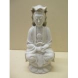 A 19th century chinese blanc de chine figure of Guanyin, 19cm tall, minor chips to robe otherwise