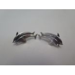 A pair of silver Georg Jensen dolphin earrings, no:129, 3cm long, generally good with some small